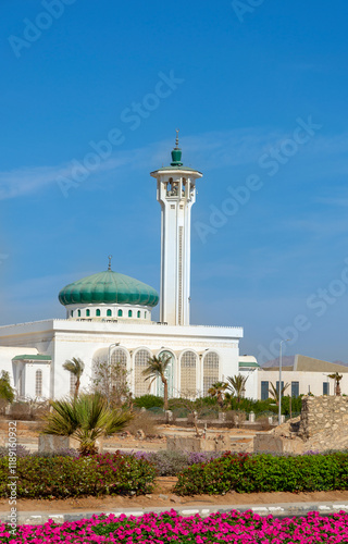Sharm El Sheikh, Egypt. Minaret in traditional oriental style against the blue sky and landscape of the Al Salam Mosque