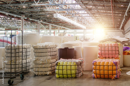 Packs of foam rubber in warehouse
