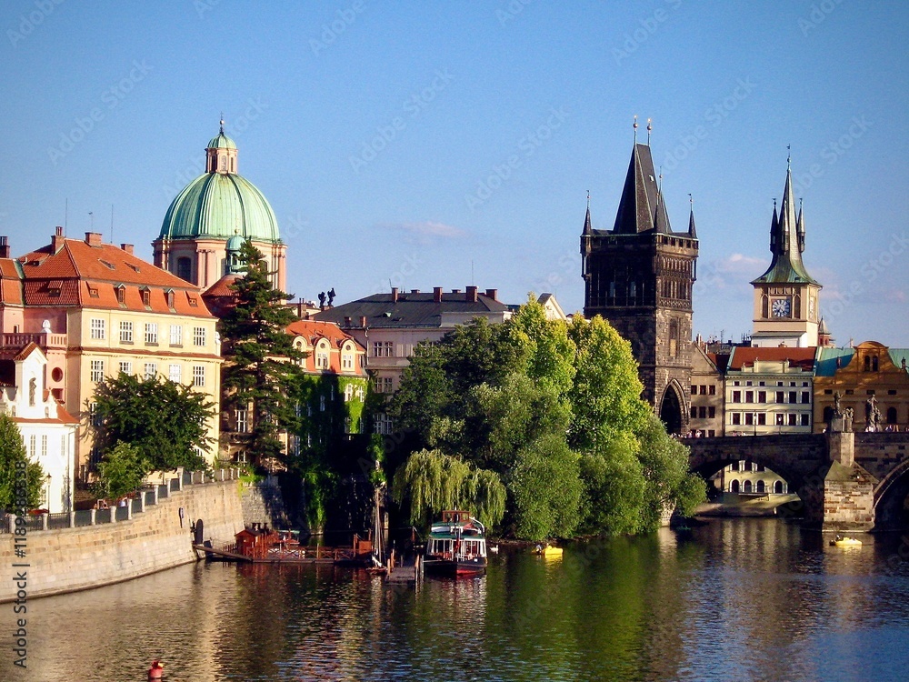 Fototapeta premium Riverside View with Historical Towers (Prague, Czechia) 