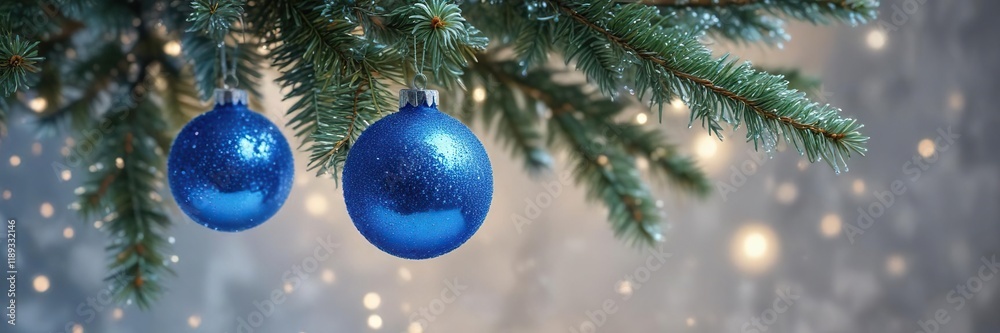 Sparkling blue glittery ornament on frosted fir branch, Christmas bauble, winter wonderland
