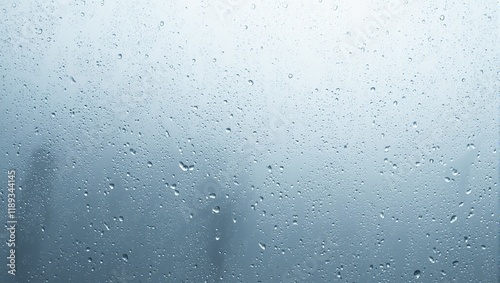 Transparent glass with captivating condensation streaks water droplets cascading down in a refreshing display