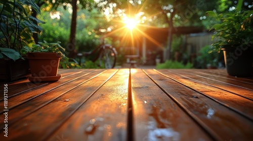 Wooden patio table at sunset, garden view. photo