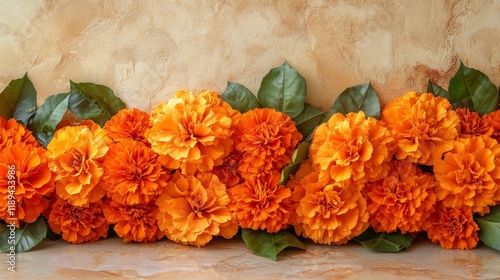 Bright orange flowers arranged in a beautiful display on a neutral background