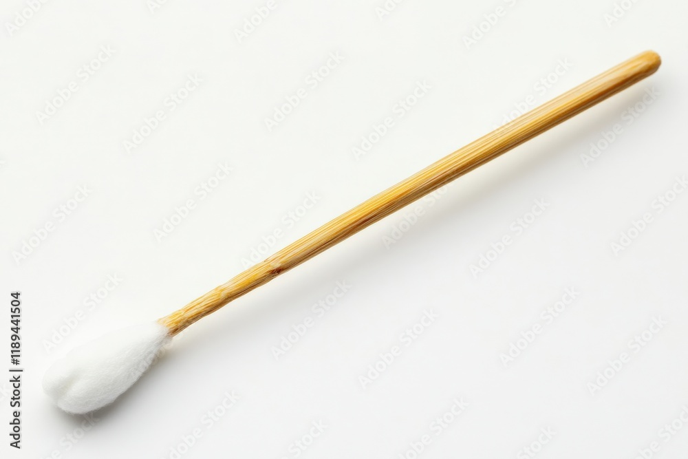 A single cotton swab on a white background A single cotton swab on a white background