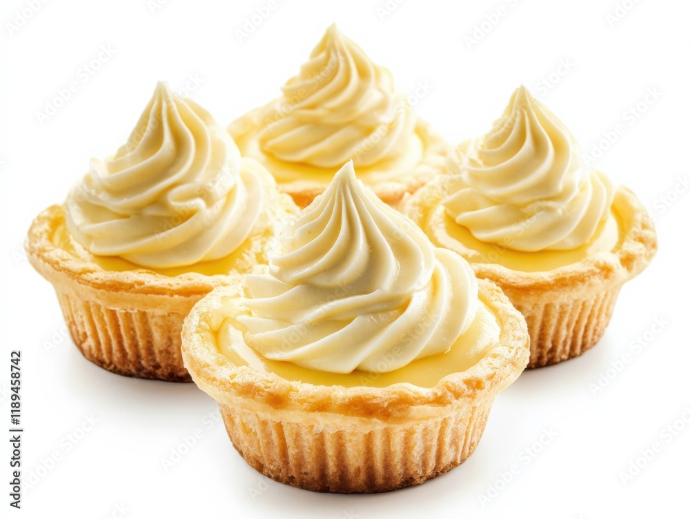 four small custard tarts with a swirl of icing on top four small custard tarts with a swirl of icing on top