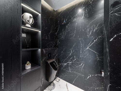 Black marble toilet. Private house.