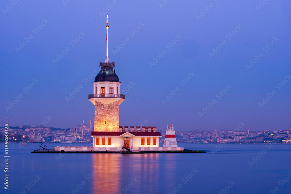 Fototapeta premium Istanbul's Maiden's Tower at Twilight, Majestic Silhouette. A captivating view of Istanbul's Maiden's Tower at twilight. The iconic Maiden's Tower (Leander's Tower) in Istanbul, Turkey