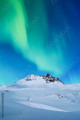 Obraz na płótnie Aurora Borealis. Northern lights. Nature. Scandinavian countries. Snow and ice on the mountains. Winter landscape on the north. Photo for background, wallpaper, postcards. w salonie
