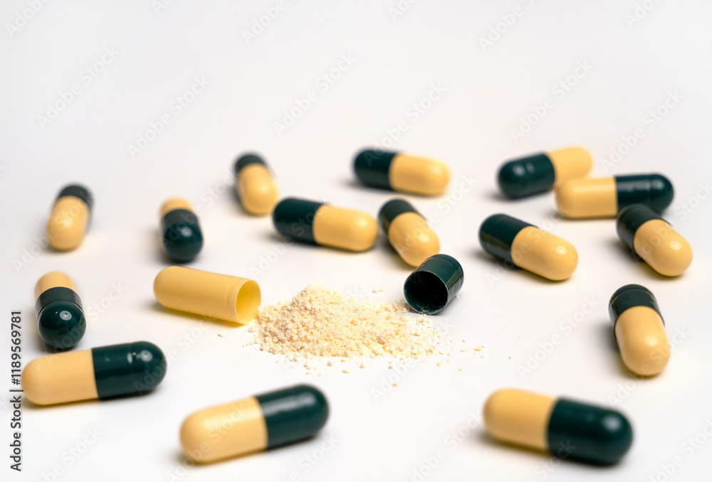 a capsule with a medicinal product. The concept of medical care. Pharmaceutical preparations for the treatment of sick patients. Close-up macro photography a capsule with a medicinal product. The concept of medical care. Pharmaceutical preparations for the treatment of sick patients. Close-up macro photography