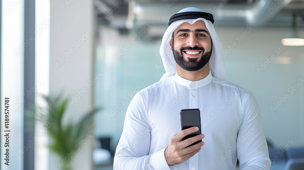Smiling Middle Eastern entrepreneur holding a mobile phone in a contemporary office setting, reflecting digital business management and app innovation. Middle Eastern entrepreneur, Smiling Middle Eastern entrepreneur holding a mobile phone in a contemporary office setting, reflecting digital business management and app innovation. Middle Eastern entrepreneur,