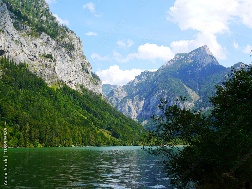 A hidden mountain lake nestled among rocky peaks