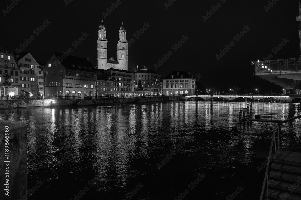 Nighttime View of Historic City Center with Illuminated Cathedral and Buildings in Zurich Nighttime View of Historic City Center with Illuminated Cathedral and Buildings in Zurich