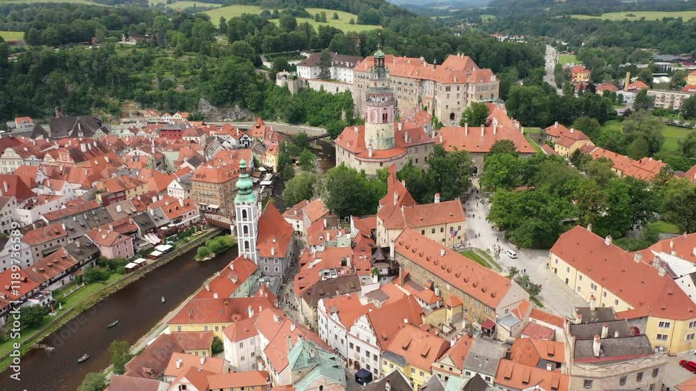 Aerial View of Cesky Krumlov, a Picturesque Medieval Town with Red Rooftops and a Winding River in the Czech Republic Aerial View of Cesky Krumlov, a Picturesque Medieval Town with Red Rooftops and a Winding River in the Czech Republic