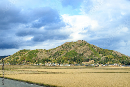 Rural Japanese Landscape with Mountain and Farmland, Toyooka, Japan photo