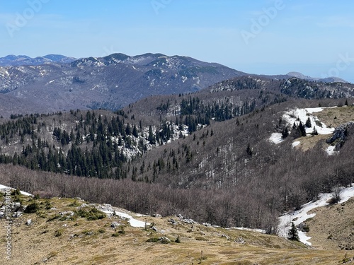 The last remnants of spring snow after a long and harsh mountain winter - Northern Velebit National Park, Croatia (Posljednji proljetni ostaci snijega nakon duge i oštre zime - NP Sjeverni Velebit) photo