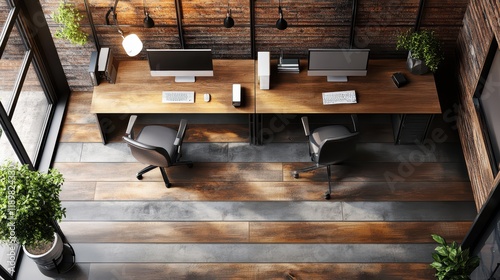 A top view of an office workplace interior reveals a neatly organized space featuring a PC desktop and armchairs. photo