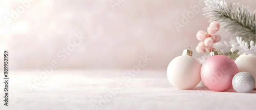 Elegant holiday decorations featuring pastel ornaments and evergreen foliage for a festive ambiance.