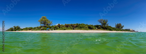 Obraz na płótnie Panoramic view of tropical island. Naples beach in sunny summer day, Florida. Summer vacation and tropical beach concept. w salonie