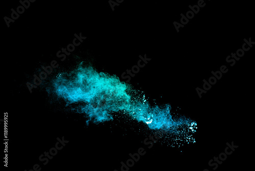 Green Color Powder Explosion Cloud On Black Background. Green Dust Splash On Dark Background.
