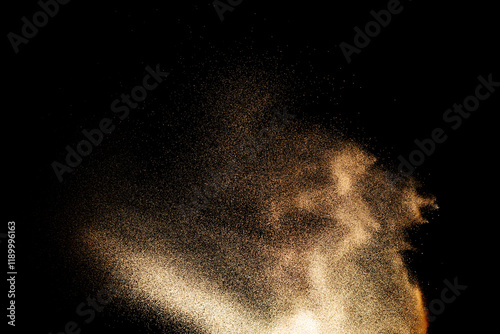 Sand flying explosion isolated on black background ,throwing freeze stop moti...