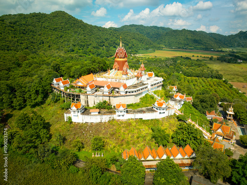 Exploring Wat Khao Phrom Sawan in Saraburi, Thailand surrounded by lush greenery on October 7, 2023 photo