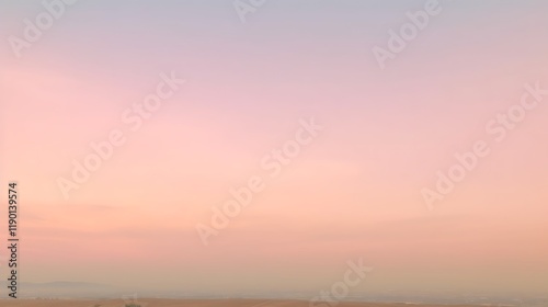Pastel Sunset Sky Over Distant Landscape