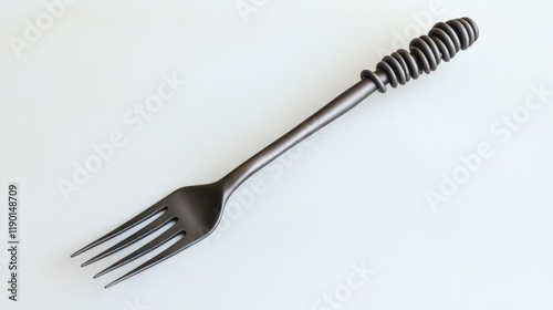 Elegant Black Fork on a Crisp White Surface for Kitchenware Display and Photography