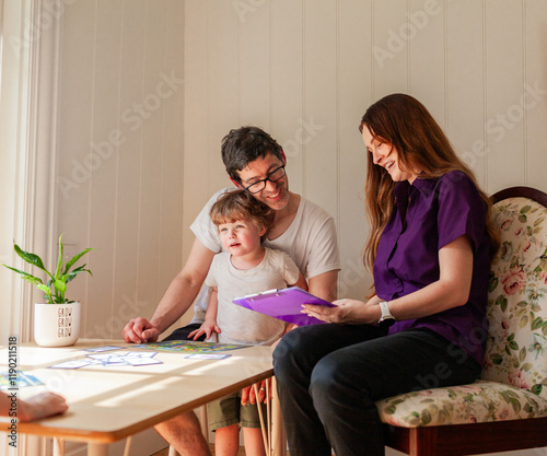 Parent chatting with speech pathologist after child's assessment at speech pathology clinic