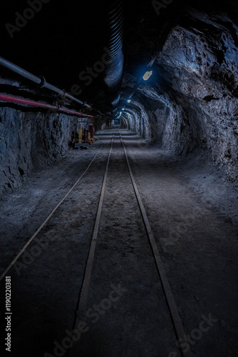 Step into history with this underground coal mine corridor, a place of resilience and hard work. Shadows and textures tell stories of miners' lives, deep beneath the earth's surface.
