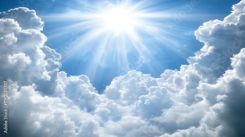 Bright sun rays bursting through fluffy white clouds in a vivid blue sky.