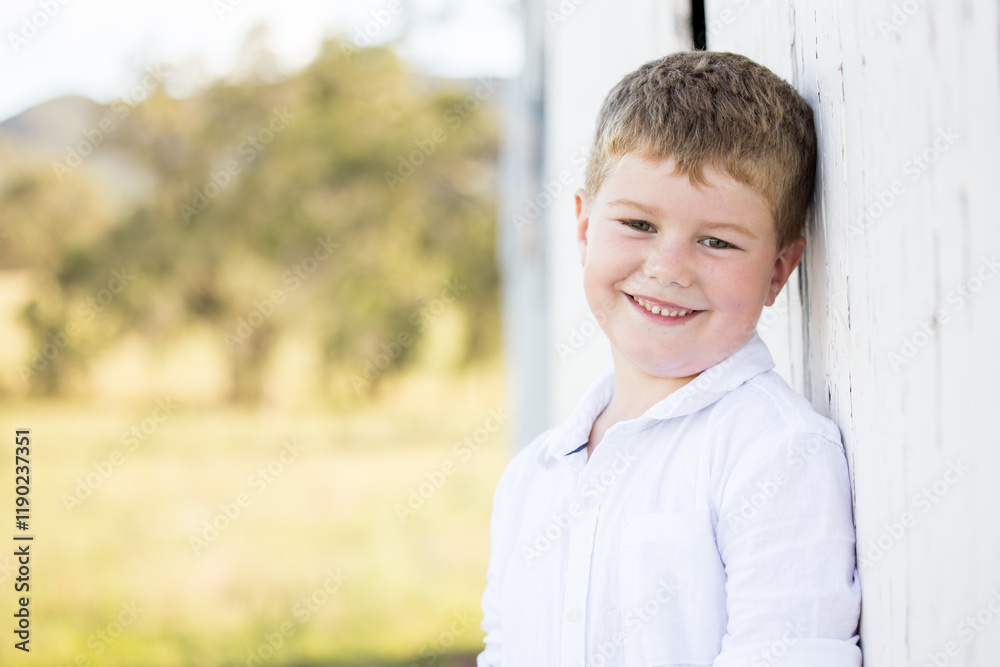 Portrait of happy little boy smiling on farm Portrait of happy little boy smiling on farm