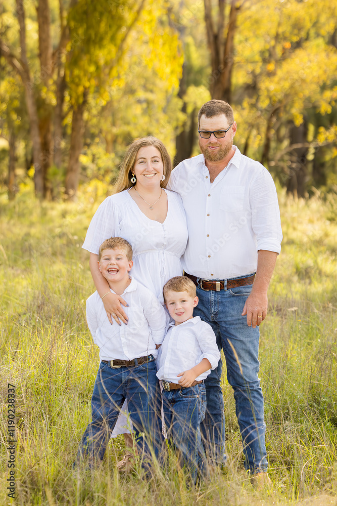 Family portrait in the Australian bush with lush green landscape Family portrait in the Australian bush with lush green landscape