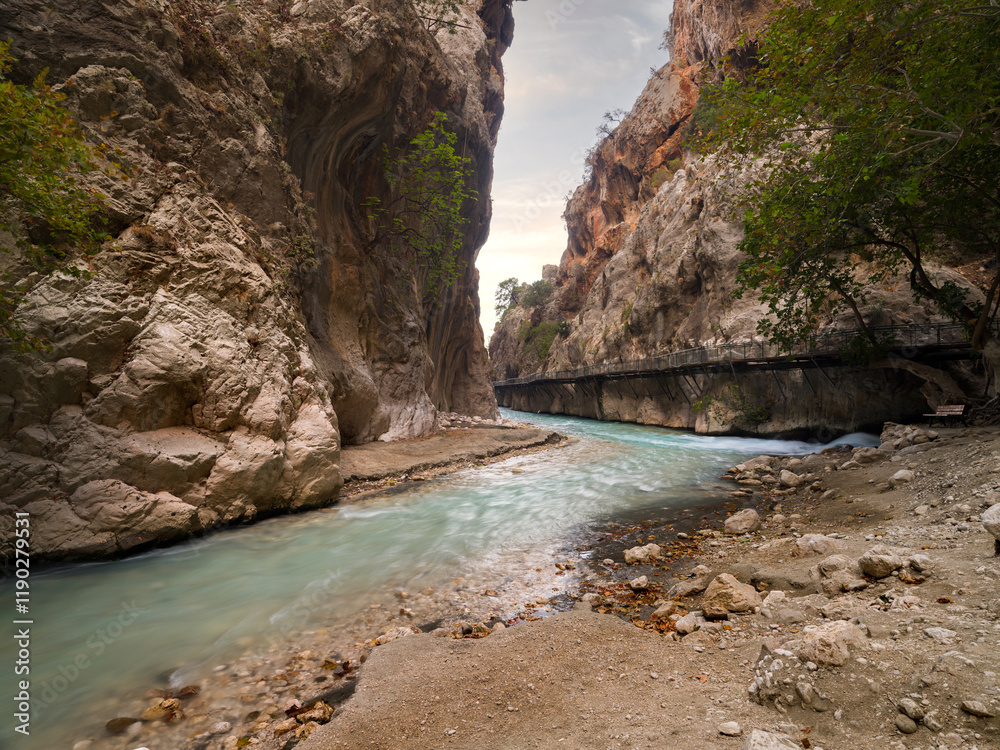 Fototapeta premium Saklikent Canyon. The spring water comes naturally from the mountains and flows between the rocks. Saklikent National Park. Travelling to Turkey country. Fethiye district, Mugla province 