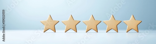 A minimalist image featuring five wooden stars arranged in a row against a soft blue background.