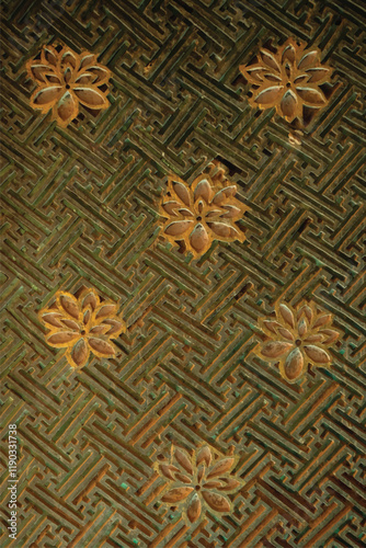 Carvings  on the church door in countryside of Nakhon Ratchasima Province. Has Chinese pattern influences. Approximately 200 years old. carving, interior, flower, countryside, grunge.