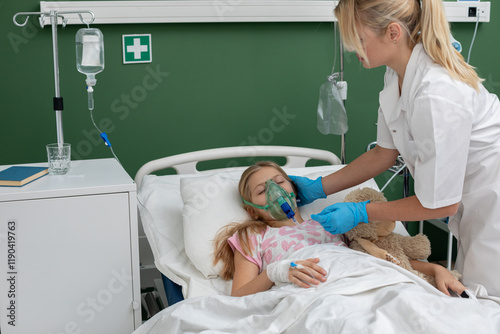 A child is in a hospital bed receiving the essential medical care needed for recovery and healing