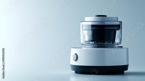 Modern white electric food processor on a light blue background. photo