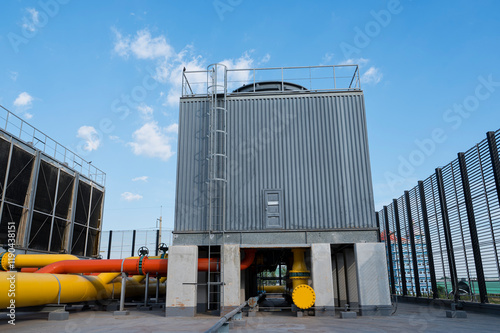 Cooling tower and pipe for air condition System (HVAC) in Factory. Cooling tower for air conditioner system in building, industrial cooling tower or ducted chiller.