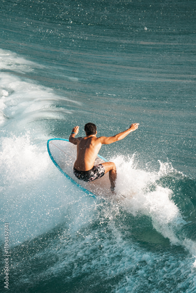 Surfing the waves, surfer catches an awesome wave on a surf board Surfing the waves, surfer catches an awesome wave on a surf board