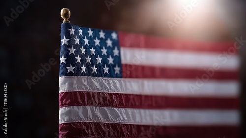 American Flag Waving Proudly Against a Clear Blue Sky Evoking Patriotism and National Pride in a Peaceful Outdoor Setting photo