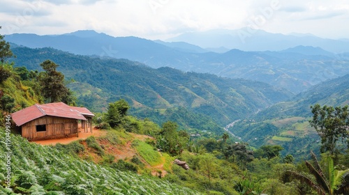 Wallpaper Mural A scenic valley nestled between lush green mountains, with a small wooden cabin adding rustic charm Torontodigital.ca