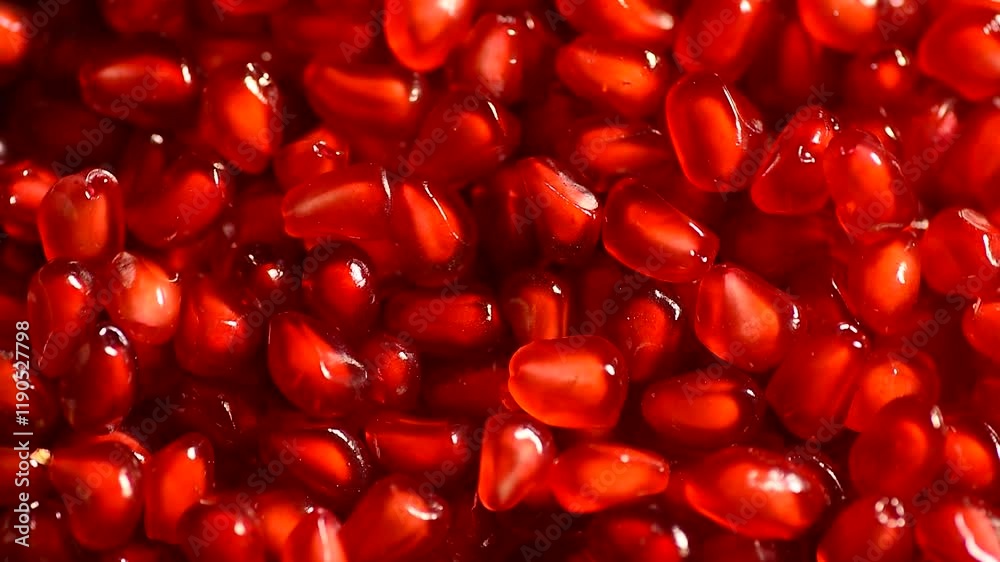 raw delicious red pomegranate seeds covering surface, healthy fruits rich with vitamins, texture, background