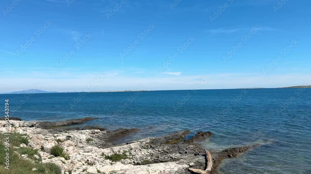 Walking along a path in a beautiful near the sea. Walking along a path in a beautiful near the sea.