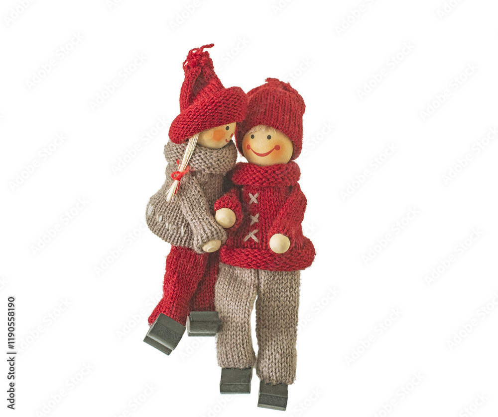 toy figures of hugging girl and boy in knitted suits suits sitting. Isolated on white background. Isolated on transparent. png format available toy figures of hugging girl and boy in knitted suits suits sitting. Isolated on white background. Isolated on transparent. png format available