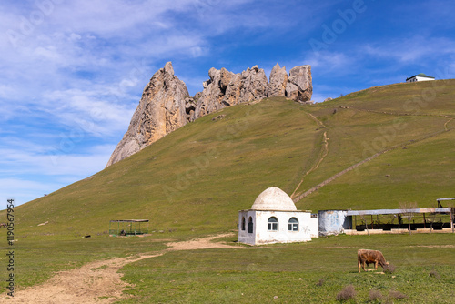 Beautiful green hills near the sacred mountain Beshbarmag. photo