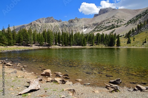 picturesque  wheeler peak, pyramid peak, and jeff davis peak on a sunny  summer day across stella lake  along the alpine lakes loop trail in great basin national park near baker, nevada
