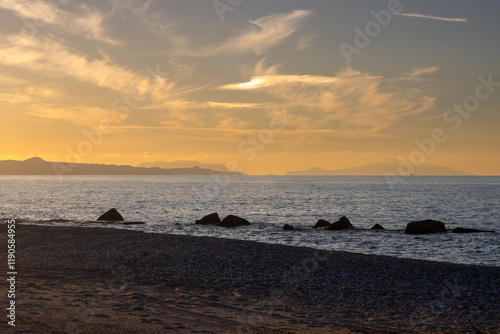Fototapeta Naklejka Na Ścianę i Meble -  Sunset on the beach, Spadafora, Sicily, Italy
