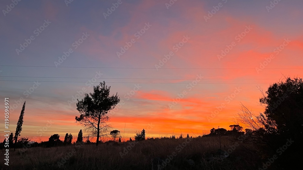 Orange sunset in Podgorica. High quality photo Orange sunset in Podgorica. High quality photo