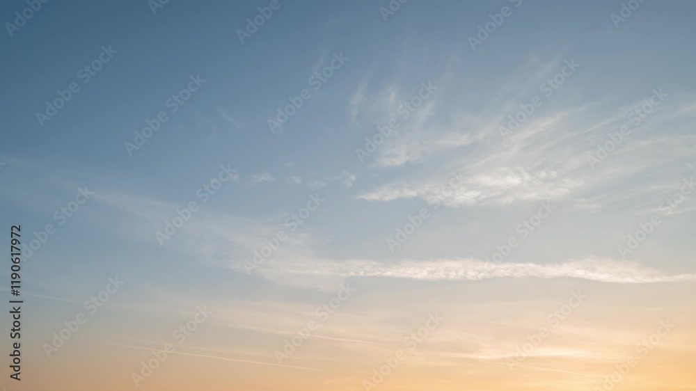 Beautiful 4K Timelapse of beautiful sunset sky with pastel blue and orange and wispy clouds