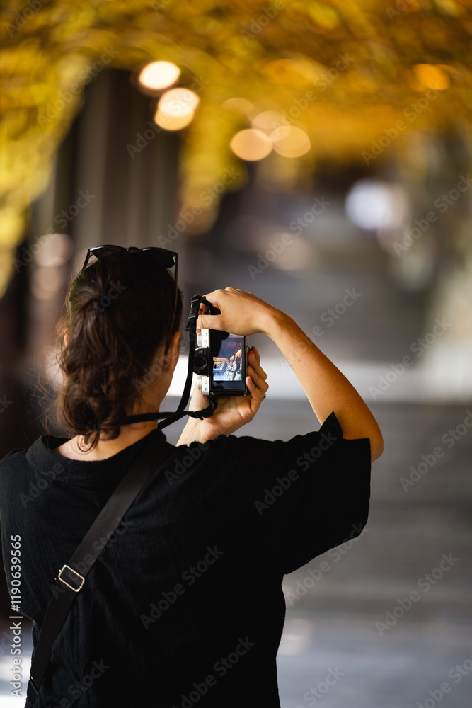Stunning view of a tourist taking pictures at the Bai Dinh Temple. Bai Dinh Pagoda in Ninh Binh Vietnam is one of the largest pagoda complexes in Southeast Asia.